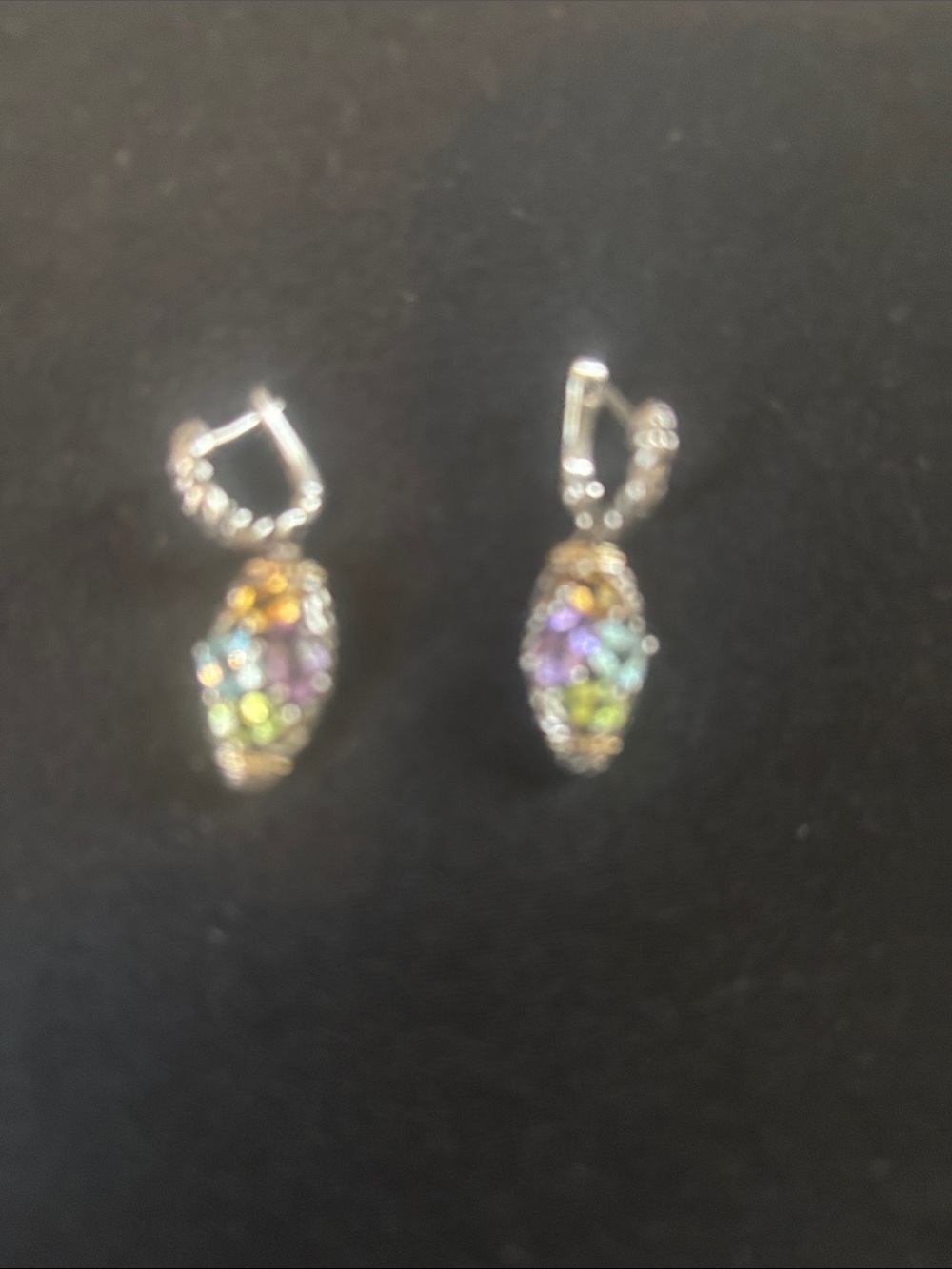 925 stamped earrings with 4 authentic stones._—